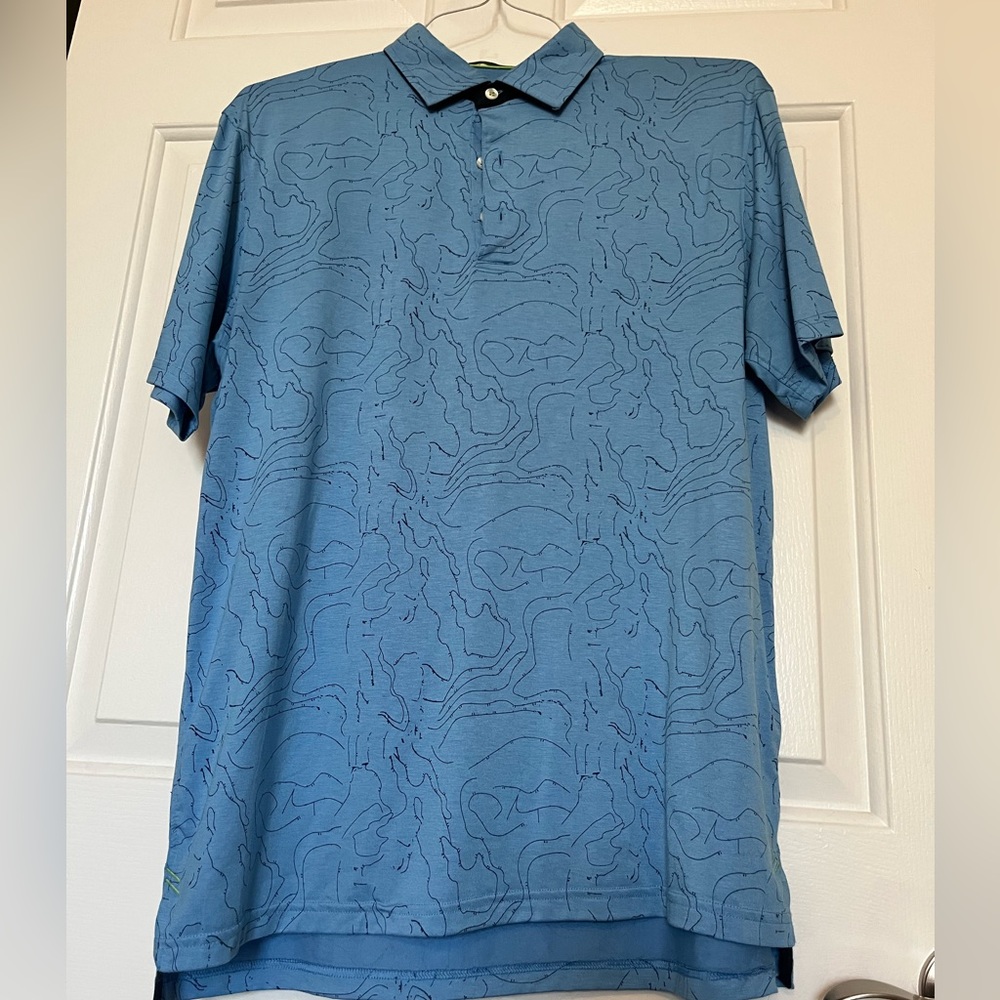 Men’s Golf Polo in blue with geometric design. Never worn.  GREAT CONDITION